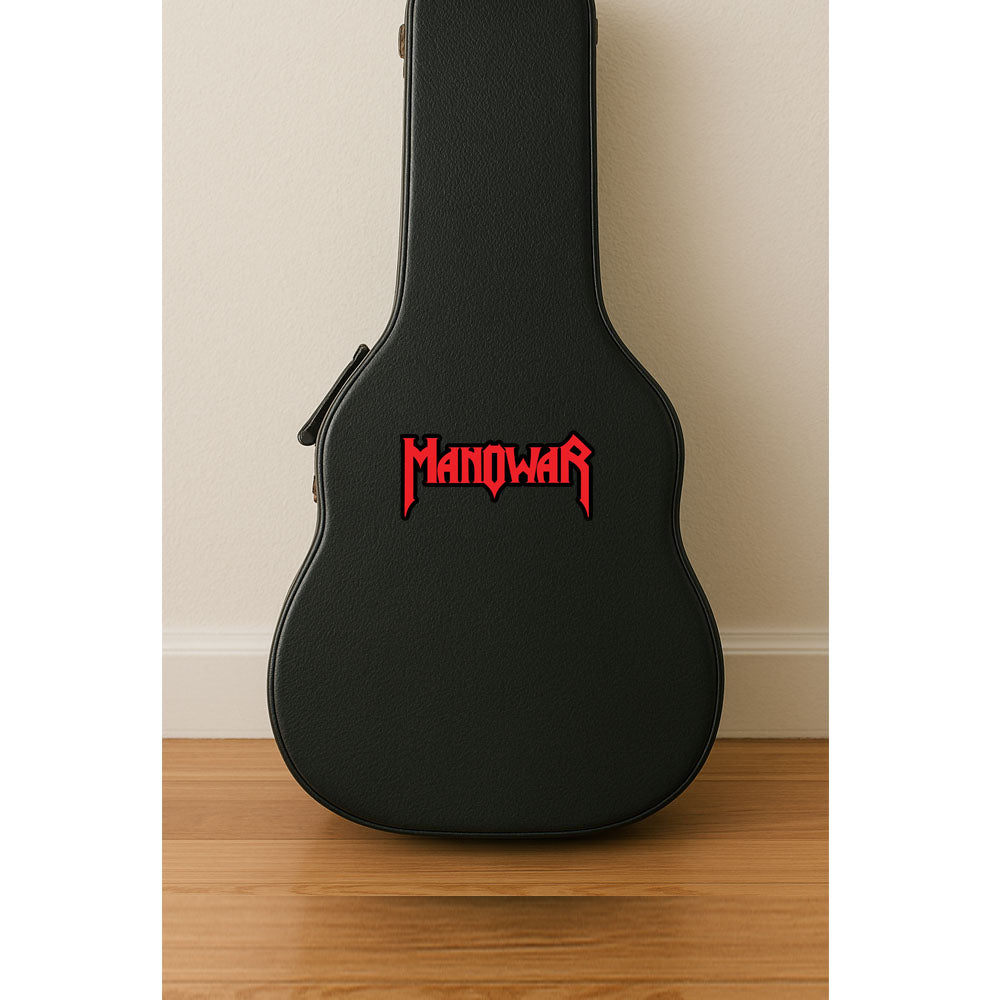 Black guitar case with 'Manowar' logo on a wooden floor against a beige wall.