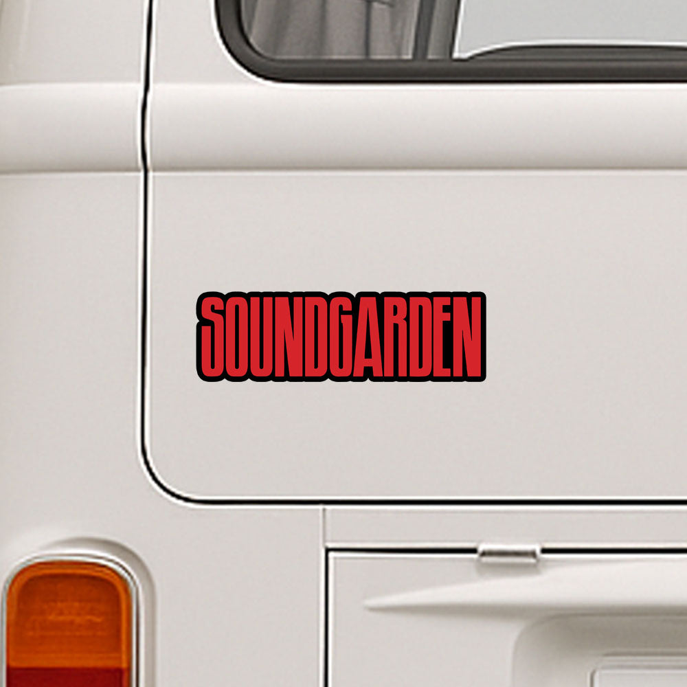Red 'SOUNDGARDEN' logo on a white vehicle
