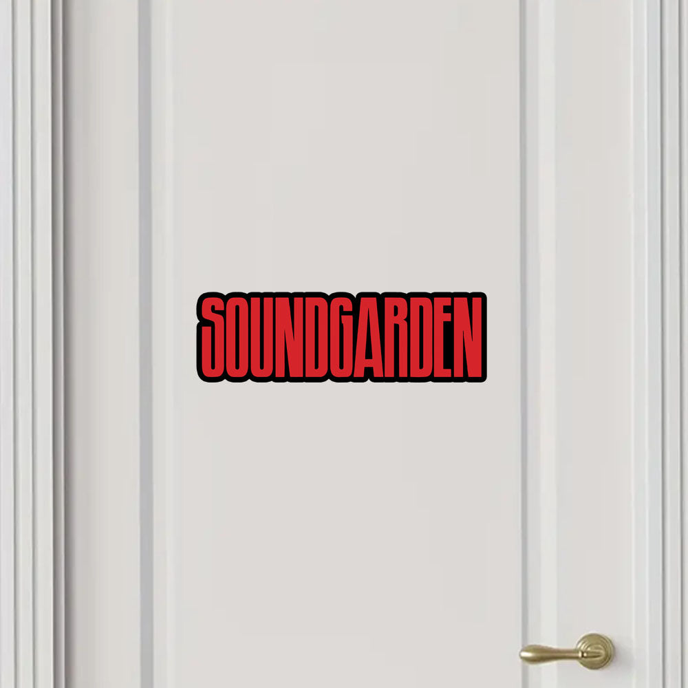 Red 'SOUNDGARDEN' logo on a white door