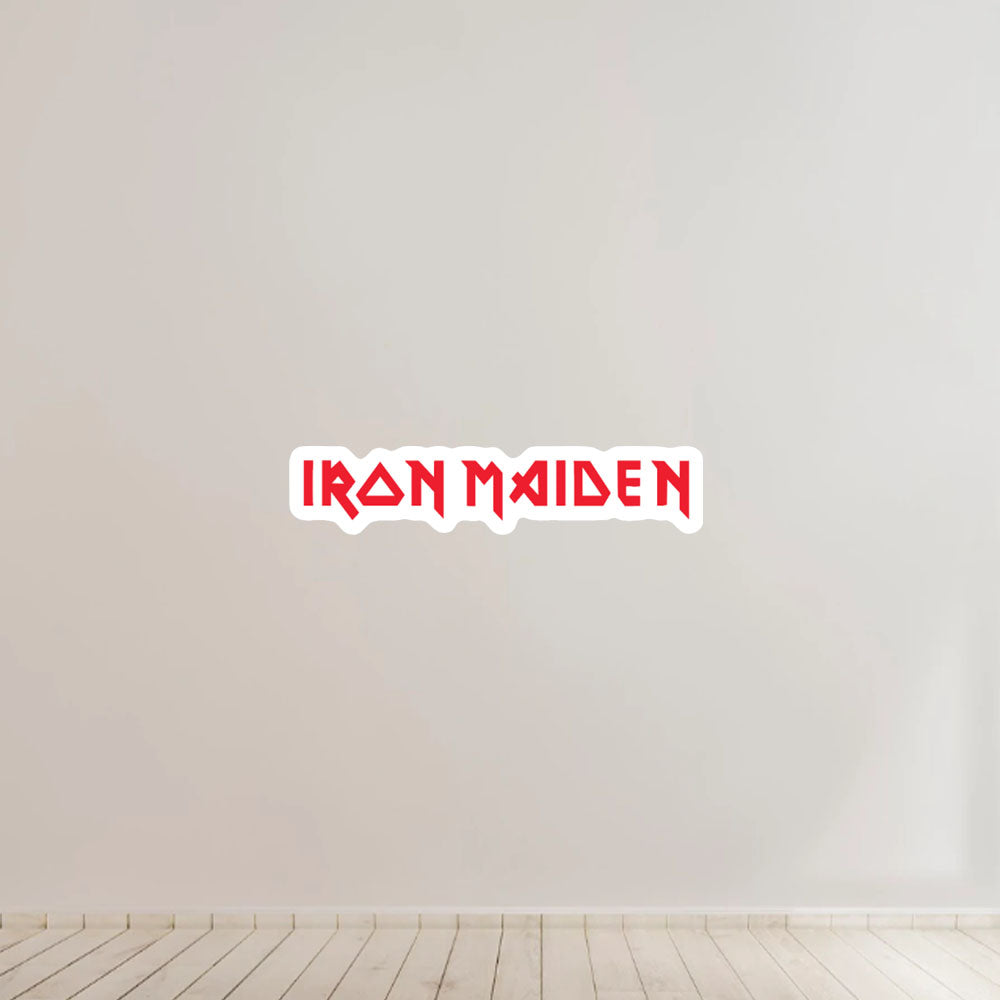 IRON MAIDEN logo on a white wall