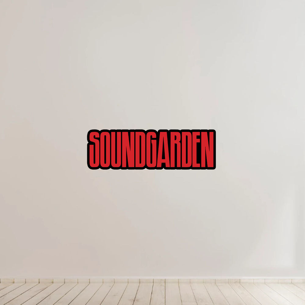 Red 'SOUNDGARDEN' logo on a white wall