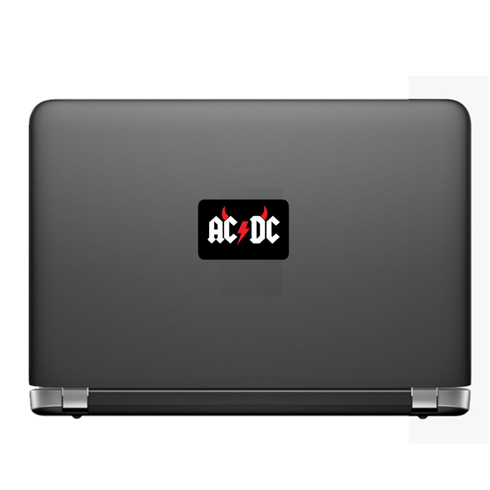Black laptop with AC/DC logo on a white background