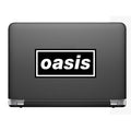 Black laptop with 'oasis' sticker on a white background